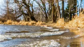 Zachód słońca nad Niegocinem widoczny z dzikiej plaży - zdjęcie 15