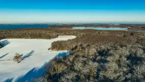 Zimowe Mazury z drona na różnych ujęciach - zdjęcie 27