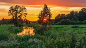 Zachód słońca nad rzeką Gołdapa w Baniach Mazurskich, lipiec 2025 r. - zdjęcie 14