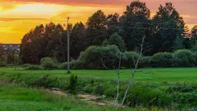 Zachód słońca nad rzeką Gołdapa w Baniach Mazurskich, lipiec 2025 r. - zdjęcie 12