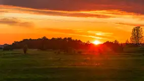 Zachód słońca nad rzeką Gołdapa w Baniach Mazurskich, lipiec 2025 r. - zdjęcie 2